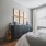 Spacious bedrooms with plank flooring and large picture windows
